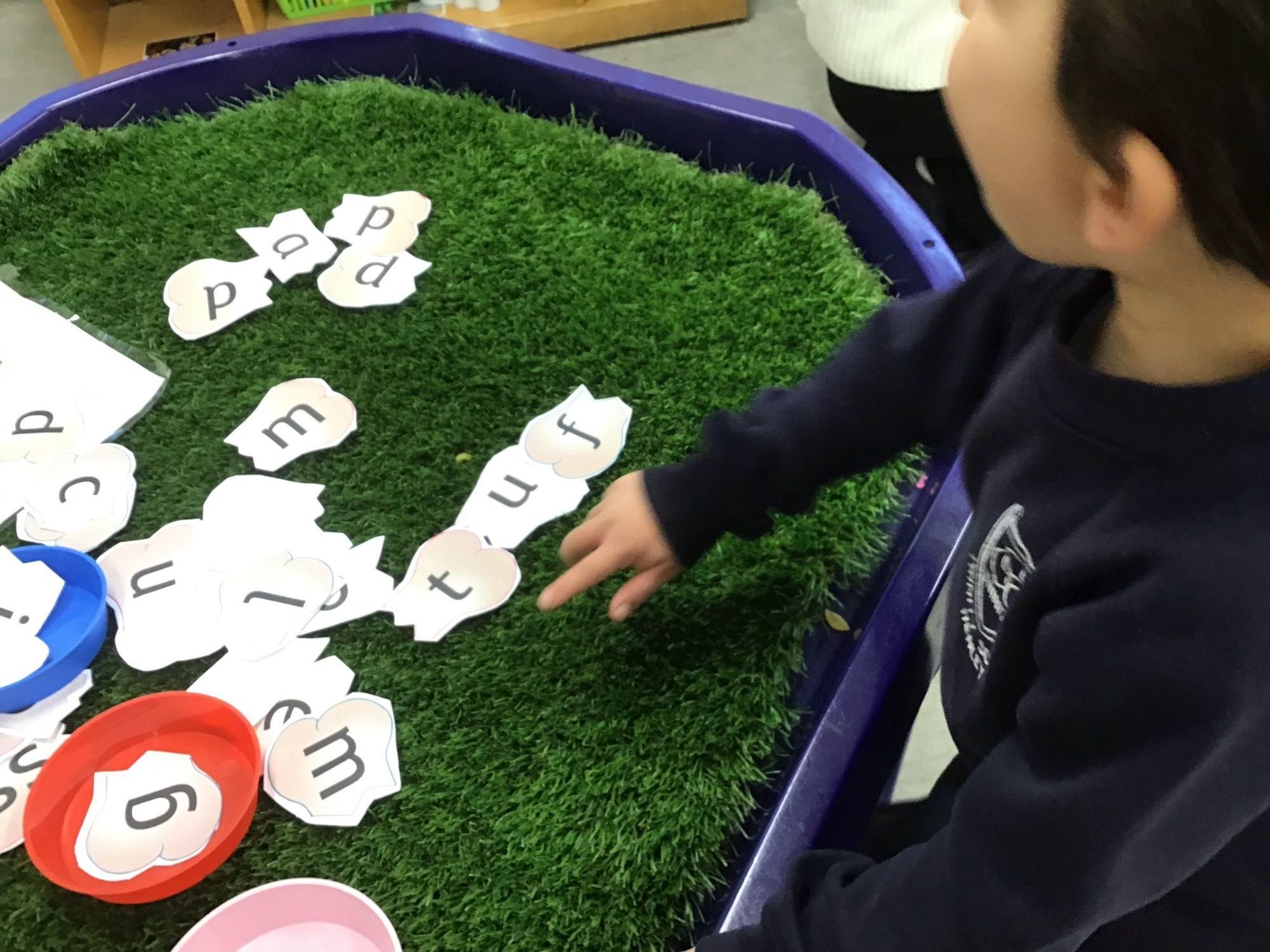 Child learning phonics photo